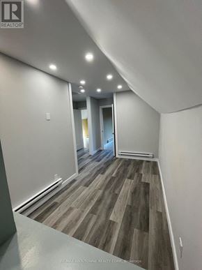 Hamilton (Stipley) duplex for rent - A hallway with wood flooring and white walls.