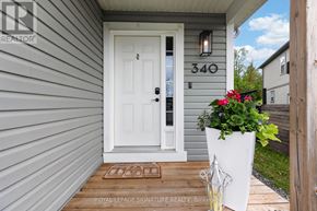 Gravenhurst (Muskoka (S)) apartment for rent - A white door with a glass window is on the front of a house.