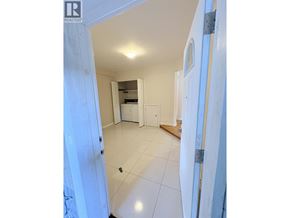 Vancouver apartment for rent - A hallway with a door on the left and a door on the right.