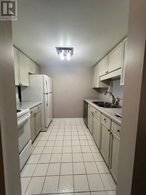 London North (North G) condo for rent - A kitchen with white cabinets and appliances.