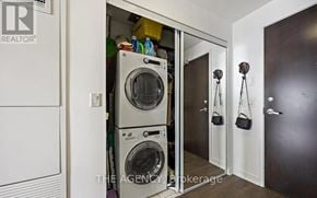Toronto (Regent Park) condo for rent - A laundry room with a washer and dryer in the doorway.
