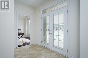 Collingwood apartment for rent - A room with a white door and a window with a view of the street outside.