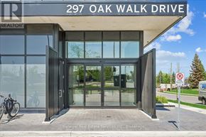 Oakville (Ro River Oaks) condo for rent - The front of a building with a glass door and a sign that says "297 Oak Walk Drive".