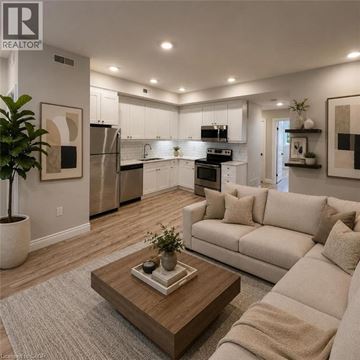 Waterloo condo for rent - A modern living room with a coffee table in the center.