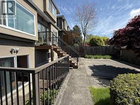 Vancouver apartment for rent - A sunny day at a residential area with apartment buildings and a clear blue sky.