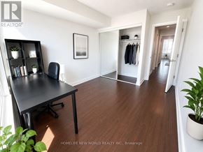 Toronto (Bendale) condo for rent - A room with a desk and a chair in it.