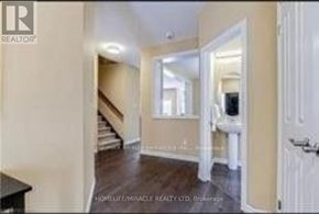 London North (North B) apartment for rent - A hallway with a staircase leading to the second floor.