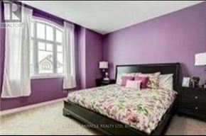 London North (North B) apartment for rent - A bedroom with purple walls and a large bed.