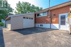 Hamilton (Westcliffe) apartment for rent - A two-car garage with a brick wall and a white door is for sale.