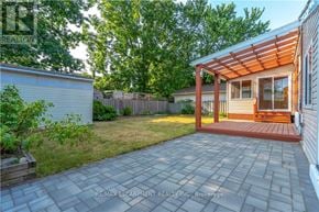 Hamilton (Westcliffe) apartment for rent - A backyard with a patio and a wooden deck.