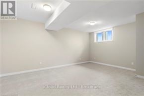 Ottawa townhouse for rent - A room with a window and a ceiling light.