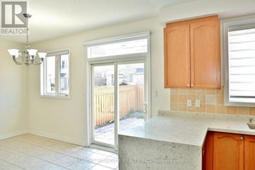 Markham (Cachet) apartment for rent - A kitchen with a sink, cabinets and a window.