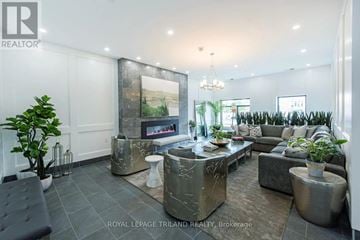 London North (North R) condo for rent - A living room with a grey sofa and a coffee table.