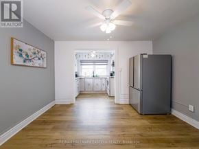 Kawartha Lakes (Bobcaygeon) apartment for rent - A spacious kitchen with a refrigerator on the right side.