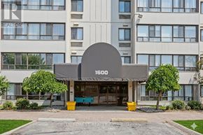 London North (North C) condo for rent - The entrance to a building with the number 1600 on it.