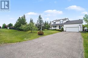 Ottawa apartment for rent - A house with a driveway in front of it is for sale.