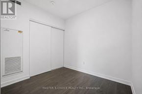 Toronto (Church-Yonge Corridor) condo for rent - A white room with a Master's Choice Realty Inc. sign on the wall.