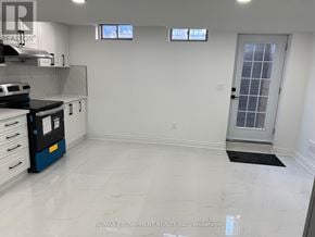 Hamilton (Stoney Creek Mountain) apartment for rent - A kitchen with white cabinets and a black dishwasher.