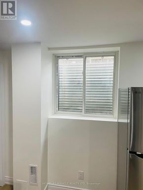 Oakville (Wm Westmount) apartment for rent - A window with white blinds in a room with white walls.