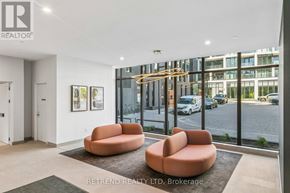 Toronto (Banbury-Don Mills) condo for rent - A room with a large window overlooking a cityscape.