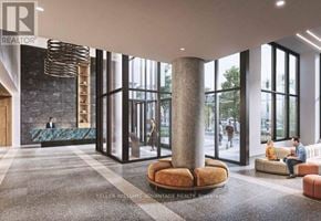 Toronto (South Riverdale) condo for rent - A realtor's office with a reception desk and a large window.