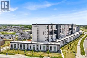 Lasalle condo for rent - A modern apartment complex with a clear blue sky above.