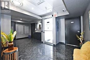 Barrie (Ardagh) condo for rent - A realtor's office with a black and white color scheme.