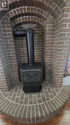 Listowel apartment for rent - A wood burning stove in a brick oven.