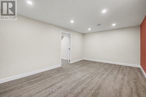 Ottawa townhouse for rent - A room with a door and a wall with a logo that says REALTOR.
