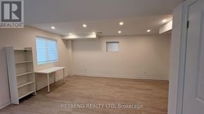 Vaughan (Patterson) apartment for rent - A room with a desk and a bookshelf is for rent.