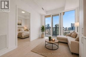Toronto (Church-Yonge Corridor) condo for rent - A spacious living room with a view of the city skyline.