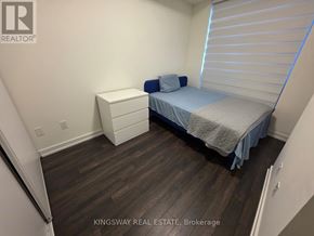 Toronto (Church-Yonge Corridor) condo for rent - A bedroom with a bed, nightstand, and dresser.