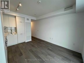 Vaughan (Concord) condo for rent - A room with a kitchenette and a refrigerator.