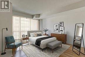 Toronto (Bay Street Corridor) condo for rent - A bedroom with a bed, chair, and a nightstand.