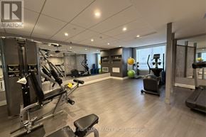 Markham (Cornell) condo for rent - A well-equipped gym with various exercise machines and equipment.