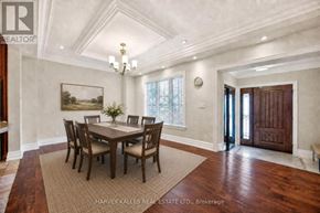 Toronto (Humber Heights) apartment for rent - A dining room with a wooden table and chairs.