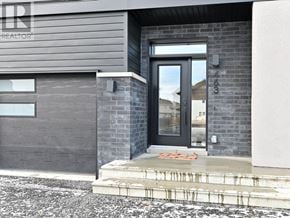 Alfred And Plantagenet apartment for rent - A grey house with a black door and a glass window.