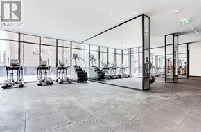 Toronto (Bay Street Corridor) condo for rent - A gym with treadmills, exercise bikes and mirrors.