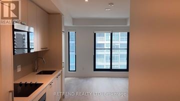 Toronto (Mount Pleasant West) condo for rent - A kitchen with a stove top oven and a sink.