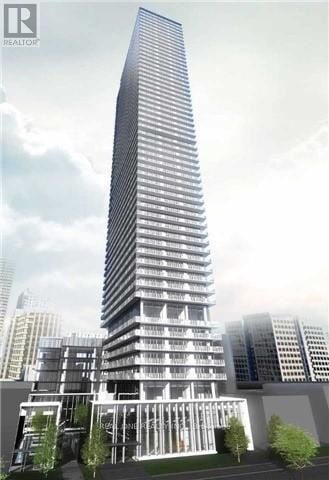 Toronto (Church-Yonge Corridor) condo for rent - A tall, modern building with a glass facade and a curved section at the bottom.