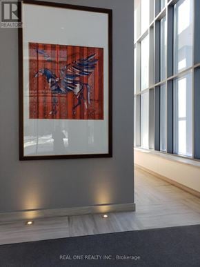 Toronto (Church-Yonge Corridor) condo for rent - A framed picture of a horse is hanging on a wall in a room.