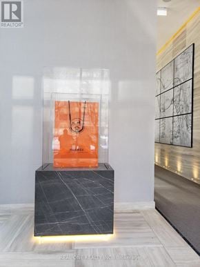 Toronto (Church-Yonge Corridor) condo for rent - A modern art piece is displayed in a glass case.