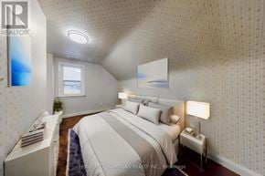 Toronto (Agincourt South-Malvern West) apartment for rent - A bedroom with a large bed and a window.