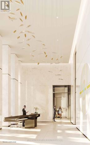 Toronto (Annex) condo for rent - A modern office lobby with people walking and standing.