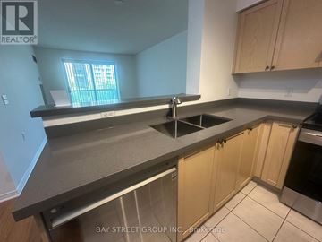 Toronto (Willowdale East) condo for rent - A kitchen with a sink and a window.