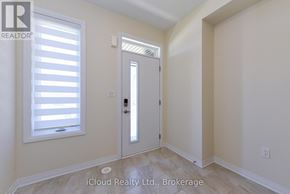 Oakville (Go Glenorchy) townhouse for rent - A room with a door and a window with blinds.
