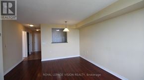 Toronto (Agincourt North) condo for rent - A room with wooden floors and white walls.