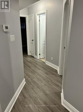 Oshawa (Donevan) apartment for rent - A hallway with a door on the left and a door on the right.