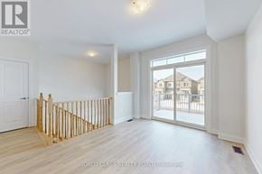 Richmond Hill (Oak Ridges) townhouse for rent - A real estate listing photo of a white room with a window.