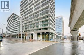Richmond apartment for rent - A modern building with the logo REALTOR on the top left corner.